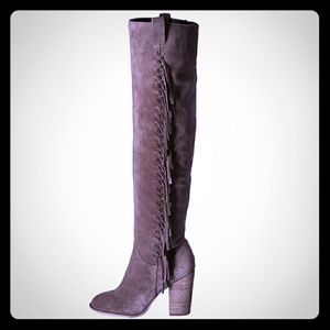 Above-the-knee Carlos Santana boots